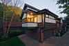 A dusk shot Photo of New Tudor modern home