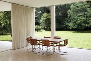 Radiant heated travertine floors from Italy fill the home. The original design called for sourcing from nearby Indiana, and the upgrade was one of the many elements that caused the home to go over budget.