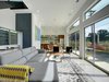 Modern home with Living Room, Recessed Lighting, and Concrete Floor. Open two-story floor plan designed for comfort and ideal for entertaining. Photo 2 of KRDB Swede Hill Modern