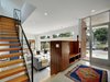 Modern home with Staircase, Wood Tread, and Metal Railing. Front Entryway Photo 13 of KRDB Swede Hill Modern