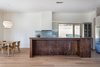 Kitchen island made from salvaged Claro walnut Photo 3 of Good Haus modern home