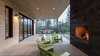 Modern home with Outdoor and Pavers Patio, Porch, Deck. Deep west porch shelds the house from overheating and provides year-round exterior living space Photo 11 of Good Haus