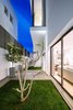 Modern home with Outdoor, Shrubs, Garden, Trees, Grass, Gardens, Raised Planters, Small Patio, Porch, Deck, Concrete Patio, Porch, Deck, Planters Patio, Porch, Deck, Metal Patio, Porch, Deck, Horizontal Fences, Wall, and Landscape Lighting. Private garden in the night Photo 18 of A House in Yarmouk