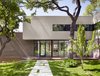 Modern home with Exterior, House Building Type, Brick Siding Material, and Stucco Siding Material. Photographer: Casey Dunn Photo of West Lake Hills Residence