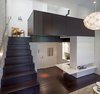 This image is a good indication of the three separate living levels in the space.
Photographer: Taggart Sorensen Photo of Micro-Loft modern home