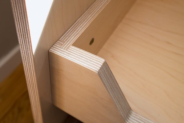 Laundry cabinets. Custom pull-out drawer with maple multi-ply.
http://www.doolittledesign.com