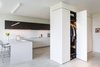 Modern home with Storage Room and Closet Storage Type. Boffi Georgetown Waterfront Condo Project - Kitchen and Entry Closet Photo 3 of Waterfront Condo Project