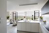Modern home with Kitchen, White Cabinet, and Porcelain Tile Floor. Boffi Georgetown Waterfront Condo Project - Kitchen into Living Space Photo 4 of Waterfront Condo Project