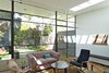 Modern home with Living Room, Track Lighting, and Medium Hardwood Floor. Living Room Photo 2 of Residence K&S