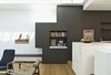 Modern home with Kitchen, Wood Cabinet, Ceramic Tile Backsplashe, Marble Counter, Track Lighting, and Medium Hardwood Floor. Kitchen Photo 4 of Residence K&S