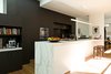 Modern home with Kitchen, Marble Counter, Wood Cabinet, Medium Hardwood Floor, Ceramic Tile Backsplashe, and Pendant Lighting. Kitchen Photo 5 of Residence K&S