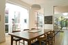 Modern home with Dining Room, Table, Medium Hardwood Floor, Pendant Lighting, and Chair. Dining Room Photo 8 of Residence K&S