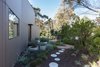 Modern home with Outdoor, Raised Planters, Trees, Side Yard, Shrubs, and Pavers Patio, Porch, Deck. Entry Steps & Landscape Photo 7 of Residence J&C