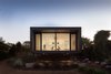 Modern home with Windows, Picture Window Type, and Wood. Street Facade at Dusk Photo 17 of Residence J&C
