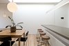 Modern home with Kitchen, Medium Hardwood Floor, White Cabinet, Engineered Quartz Counter, and Pendant Lighting. Kitchen & Dining Photo 10 of Residence L&N