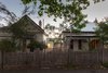 Modern home with Outdoor, Trees, Shrubs, Vertical Fences, Wall, and Front Yard. Room Bridge Photo of Residence AD&H