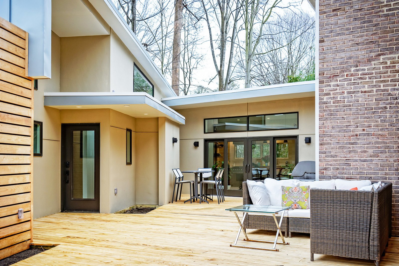 Illumination house courtyard provides entrances to the main residence and a separate entrance to the in-law suite.