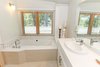 Modern home with Bath Room. white(out) house: the master bathroom is fitted with eco-friendly WaterSense fixtures. Photo 8 of white(out) house