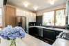 Modern home with Kitchen, Laminate Cabinet, and Glass Tile Backsplashe. white(out) house: featuring Ikea kitchen cabinets. Photo 3 of white(out) house