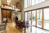 white(out) house: a wall of Loewen windows and La Cantina doors bring in an abundance of natural light. Photo 2 of white(out) house modern home