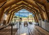 Modern home with Windows, Wood, and Picture Window Type. The extensive use of natural wood on nearly every surface makes the inside of The Barn feel like an extension of the landscape outside. Photo 2 of The Barn