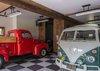 Modern home with Garage and Storage. Another view of the garage reveals its extensive space to house vehicles and protect them from the elements. Photo 6 of The Barn