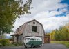 Modern home with Outdoor, Side Yard, Trees, Shrubs, Flowers, Grass, Walkways, Field, and Woodland. A classic VW bus in vintage colors shows both the scale and scope of The Barn and its surrounding scenery. Photo 7 of The Barn