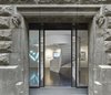 Modern home with Staircase. The entrance to X Bank showcases modern works of Dutch art and design which contrast the concrete exterior. Photo 8 of W Amsterdam