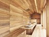 Modern home with Kitchen and Light Hardwood Floor. This unique built-in dining table is recessed into the floor, giving the room and table a seamless effect. Photo of Yoshino Cedar House