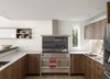 Modern home with Kitchen, Engineered Quartz Counter, Wood Cabinet, Metal Backsplashe, Range Hood, Recessed Lighting, Range, Dishwasher, Refrigerator, and Drop In Sink. Kitchen detail Photo 11 of The River House
