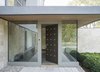 Modern home with Outdoor, Front Yard, Hardscapes, Trees, Walkways, and Shrubs. Entry door and vestibule Photo 3 of Long Island Sound House