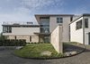 Modern home with Outdoor, Grass, Boulders, Front Yard, Hardscapes, Walkways, and Shrubs. Front elevation Photo 5 of Long Island Sound House