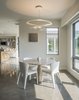 Modern home with Dining Room, Table, Chair, Accent Lighting, and Concrete Floor. Breakfast room Photo 16 of Long Island Sound House