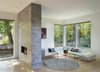Modern home with Living Room, Recessed Lighting, Sectional, Light Hardwood Floor, and Two-Sided Fireplace. The family room. Photo 11 of Old Greenwich House