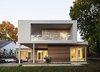 Modern home with Exterior, House Building Type, Stucco Siding Material, Metal Roof Material, Wood Siding Material, and Flat RoofLine. Exterior elevation. The master suite enjoys a large covered deck with glass railing. Photo 12 of Old Greenwich House