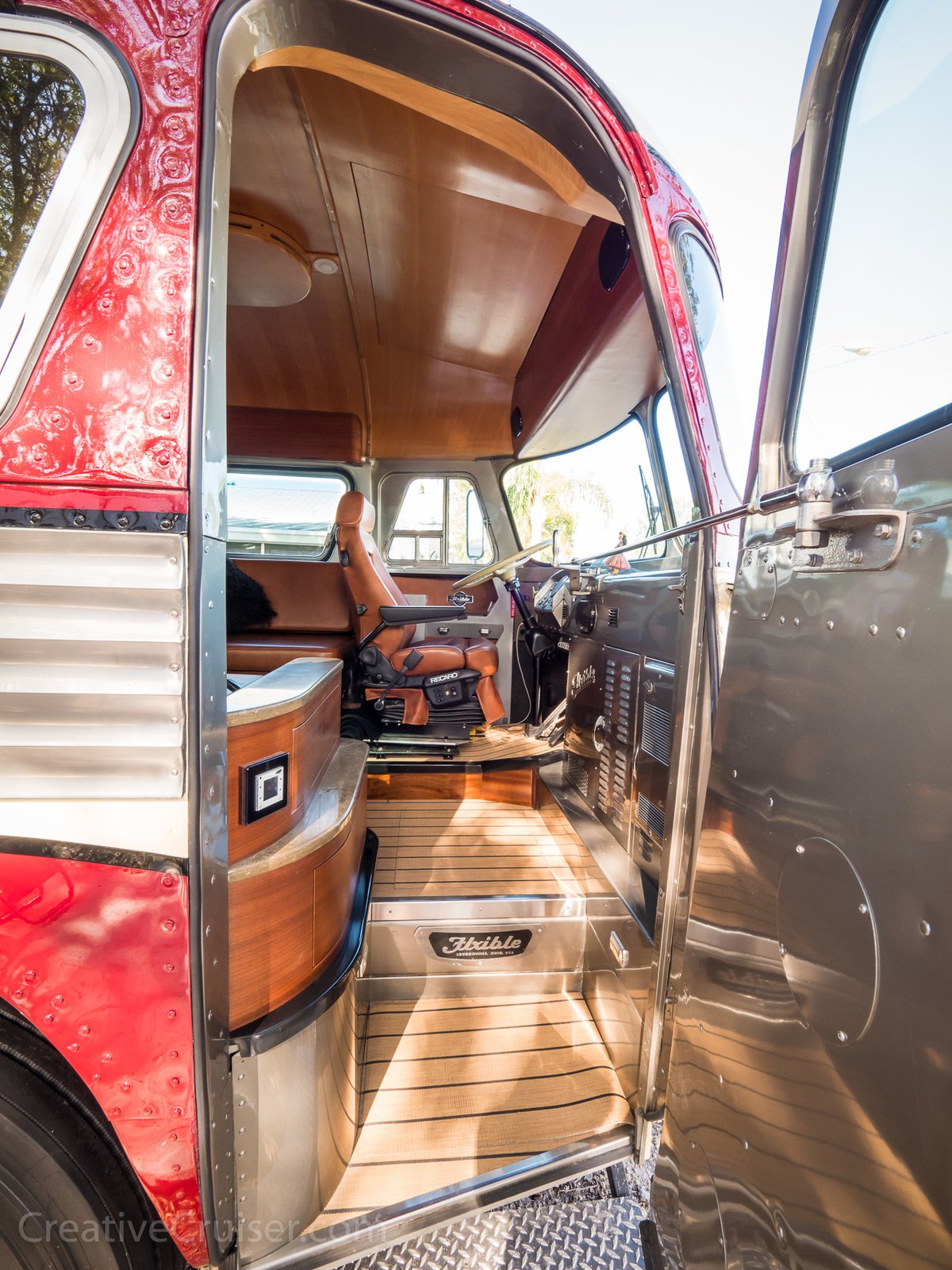 There are no door handles or traditional key holes to be found on the exterior of the bus. Access is via remote control from our tow vehicle, iPhone or even over the internet. 