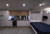 Kitchen and fold down bed Photo 14 of Cooks Hill Granny modern home