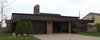 Modern home with Exterior, Flat RoofLine, House Building Type, Brick Siding Material, and Wood Siding Material. Photo credit: James N. McNally Photo 4 of The Charles S. Comey Residence by Alden B. Dow