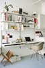 Modern home with Office, Shelves, Chair, and Desk. The home of Ryan Willms Photo of Eames Molded Chairs