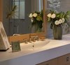 La Cava sink and matte white vanity top sits over oak cabinet. Photo 8 of A New Beginning modern home