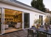 The entire great room opens up to the outdoor space. Photo 11 of A New Beginning modern home