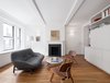 The original fireplace was restored and highlighted as the anchor to the living spaces. Photo 4 of Prewar Modern Upgrade modern home