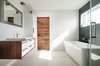 Main bathroom with RIOBEL faucets, custom made sliding door and RAMACIERI SOLIGO tiles Photo 2 of Concept DUB House modern home