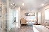 Modern home with Bath Room, Engineered Quartz Counter, Ceramic Tile Floor, Freestanding Tub, Open Shower, and Ceramic Tile Wall. Bathroom with hexagon tiles by ITAL NORD and miroir by IKEA Photo 3 of James house
