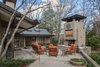 Abundant glazing on this elevation gives the homeowners constant views of their new outdoor gathering space. Photo 8 of Mid-century Modern Gathering Space modern home