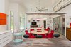 Modern home with Recessed Lighting, Pendant Lighting, and Concrete Floor. View from the kitchen to the dining area and living space. Photo 16 of The Serdar Net Zero-Net Positive Micropolis® House
