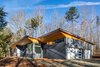 Modern home with Exterior, Metal Roof Material, Shed RoofLine, House Building Type, and Concrete Siding Material. In form, function, and materials, the Serdars' new home is decidedly modern. Photo of The Serdar Net Zero-Net Positive Micropolis® House