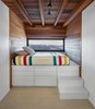 Modern home with Bedroom, Storage, Ceiling Lighting, Medium Hardwood Floor, Bed, and Light Hardwood Floor. Built-in bed with a killer view! Photo 13 of Laurentian Ski Chalet