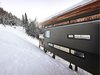 Modern home with Exterior, Wood Siding Material, Metal Roof Material, Shed RoofLine, Cabin Building Type, and House Building Type. Partial view of main facade from entry bridge. Photo 2 of Laurentian Ski Chalet