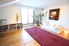 A big, open space serves as a home office and multi-purpose room. Painting by Kevin Sonmor Photo 10 of A Penthouse gets reincarnated - from the 19th Century to the 21st modern home
